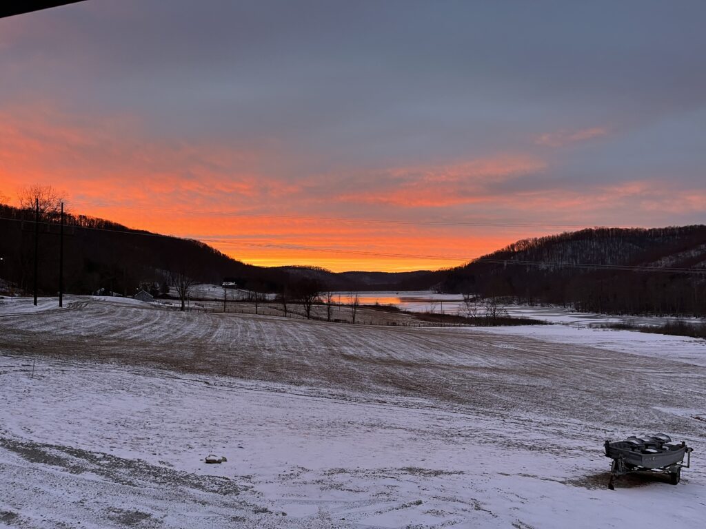 Sunrise over snowy fields
